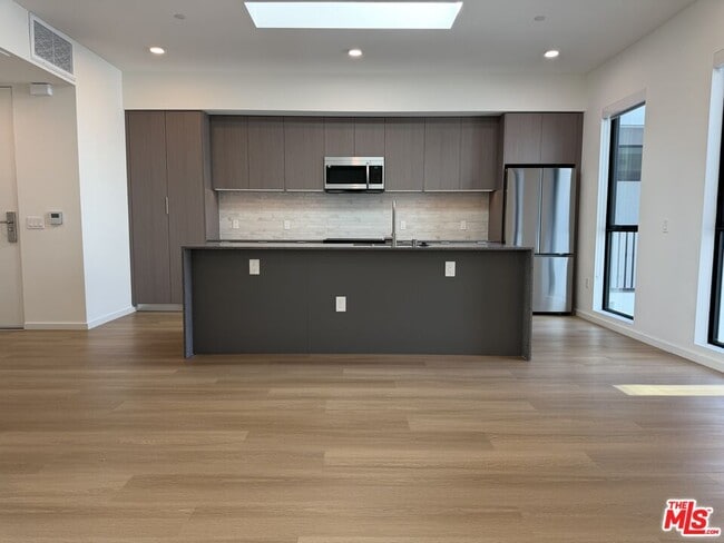 Building Photo - 5119 Colfax Ave Unit 301