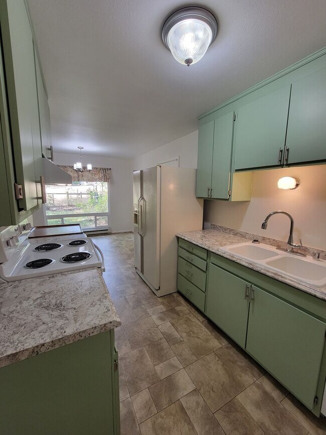 Photo - Nestled Under the Trees!  Nice Home Near W...