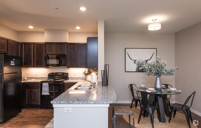 2BR, 2BA - 1039SF Kitchen & Dining