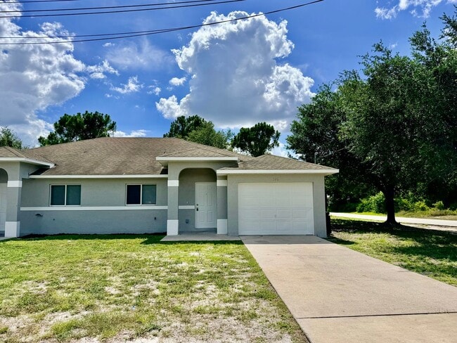 Building Photo - Charming 3BR/2BA Lehigh Acres Duplex with 1-Car Garage | Lawn Care & Salt Service Included