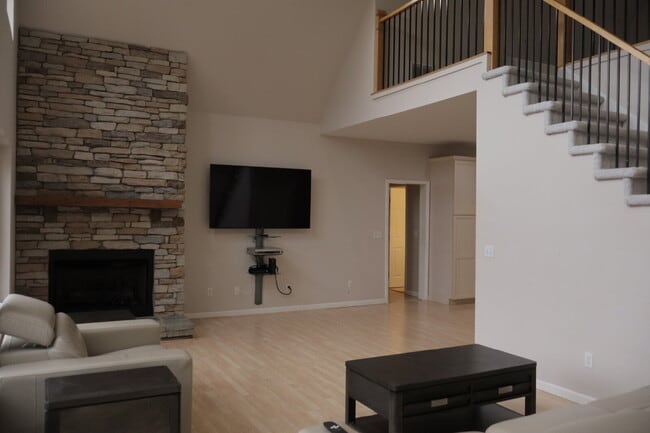Photo - Expansive Mostly-Furnished Residence featuring 3 Bedrooms, a Completed Basement, and a Loft Space
