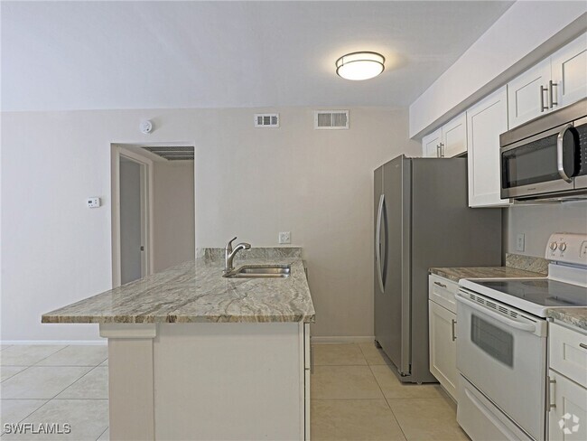 Building Photo - 5331 Summerlin Rd Unit 3106 Rental