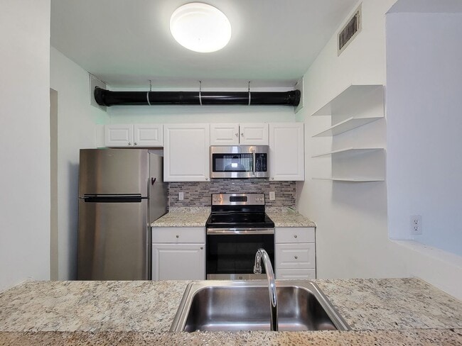 Photo - Spacious one of a kind 2 bedroom 2 bath condo in excellent condition. Entire condo has been paint...
