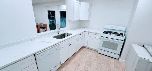 Photo - 3-Story Townhouse with Central Heat, AC and 2 Parking Spots Included