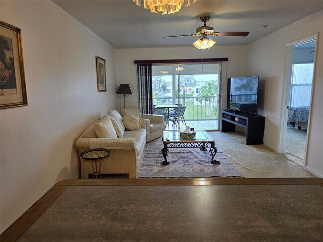 Building Photo - 6600 Royal Palm Blvd Unit 304