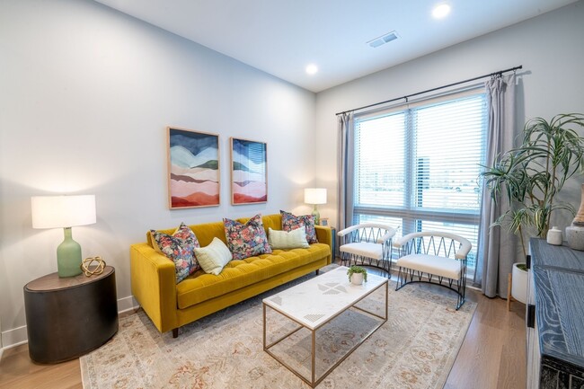 Quarry Trails Model Living Room - Tillmore at Quarry Trails Apartments