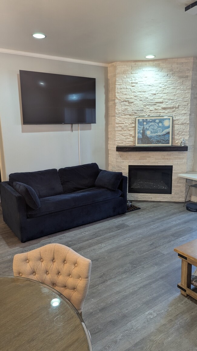 Living Room with sleeper sofa - 3990 Centre St Unit 110