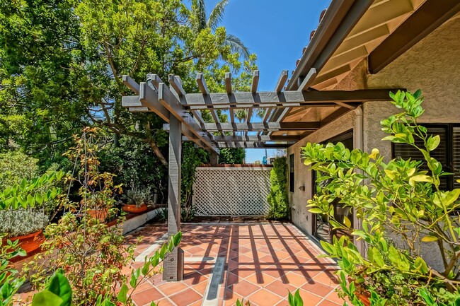 Photo - PRIME POOLFRONT LOCATION & CLOSE TO MAIN GATE! BRIGHT & SPACIOUS, END-UNIT POOLFRONT TOWNHOUSE W/...