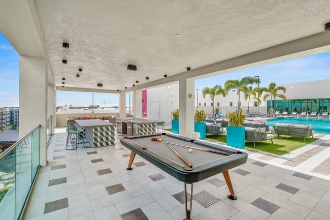Outdoor entertainment area complete with grills, pizza oven, lounge seating, billiards table and Wi-Fi.
