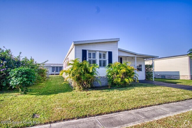 Building Photo - 2390 Coconut Palm Dr Rental
