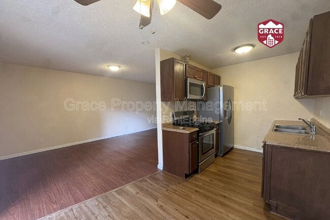Building Photo - 10782 E Exposition Ave Unit 246