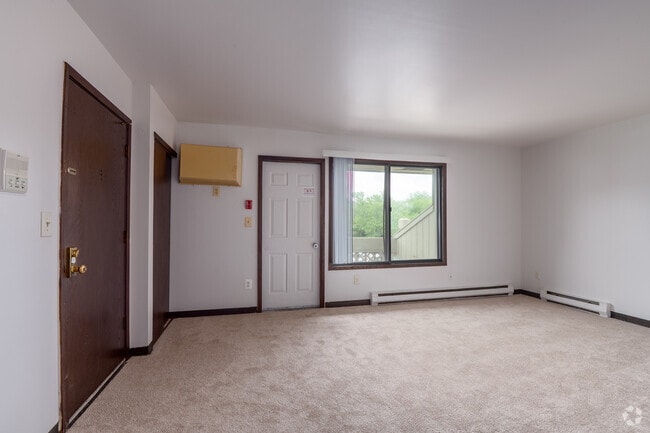 2BR, 1BA - 766SF - Living Room - Sunset Apartments