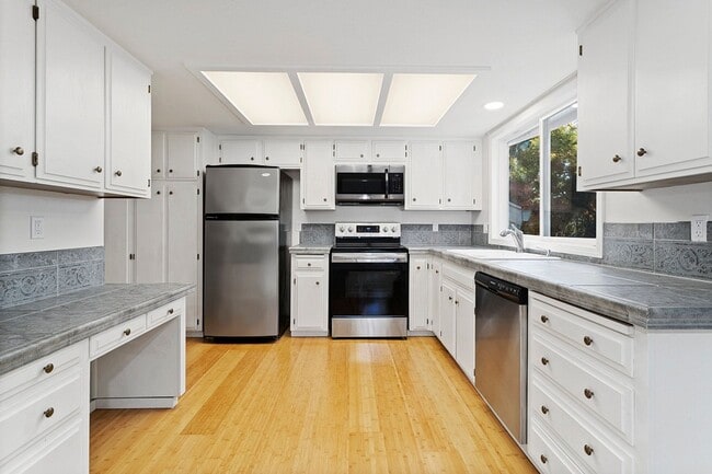 Photo - Spacious Home ! Huge living room, 2nd family room, kitchen nook and extra room off kitchen. Large...