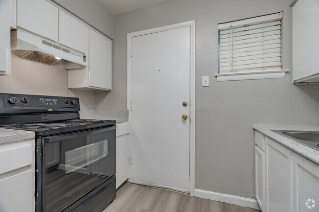 2BR, 1BA - 880SF - Kitchen - Landmark Apartments
