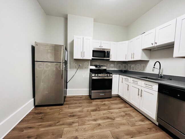 Photo - 6401 S Eberhart Ave Unit 1