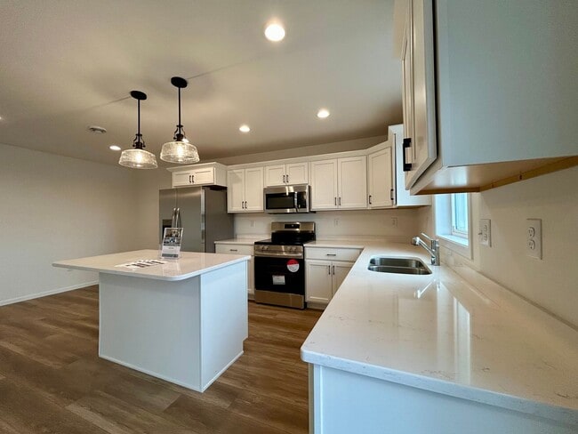 Photo - Spacious & Stylish 3-Bed Home with Modern Finishes and Attached 2-Stall Garage