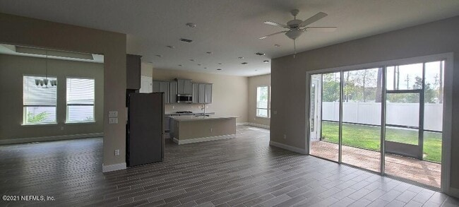 Photo - 4 bedroom home with 3 car garage In gated community