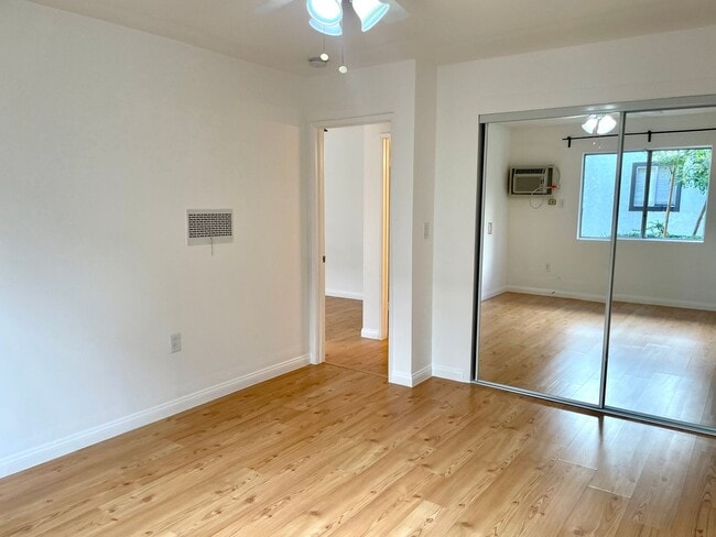 Photo - Beautiful 1 Bed/1 Bath Condo Apartment with Private Patio, Hardwood Flooring, Pool, and AC