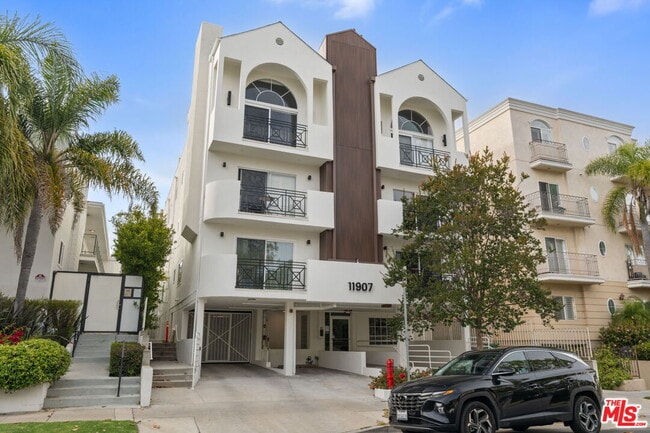 Building Photo - 11907 Darlington Ave Unit 101