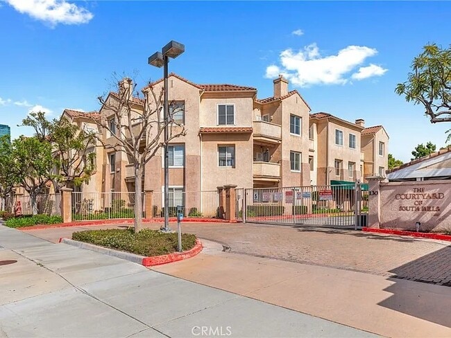 Building Photo - 130 S Barranca Ave Unit 314