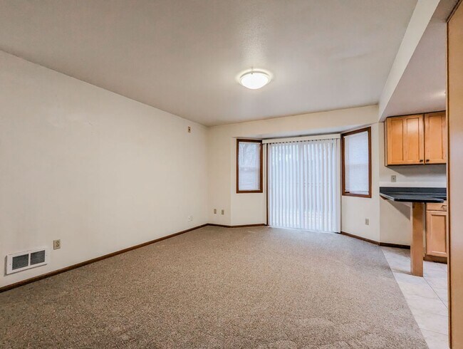 Photo - **Move-In Special** Beautiful 3 bed, 2.5 bath Rambler w/ New Carpet Throughout!