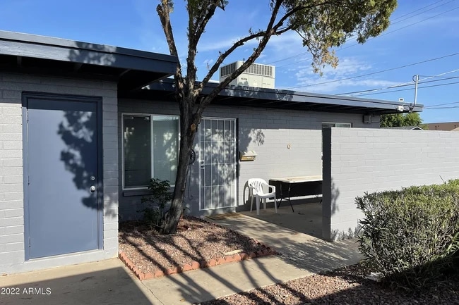 Front door and outdoor storage - 1078 W Flint St Unit C -