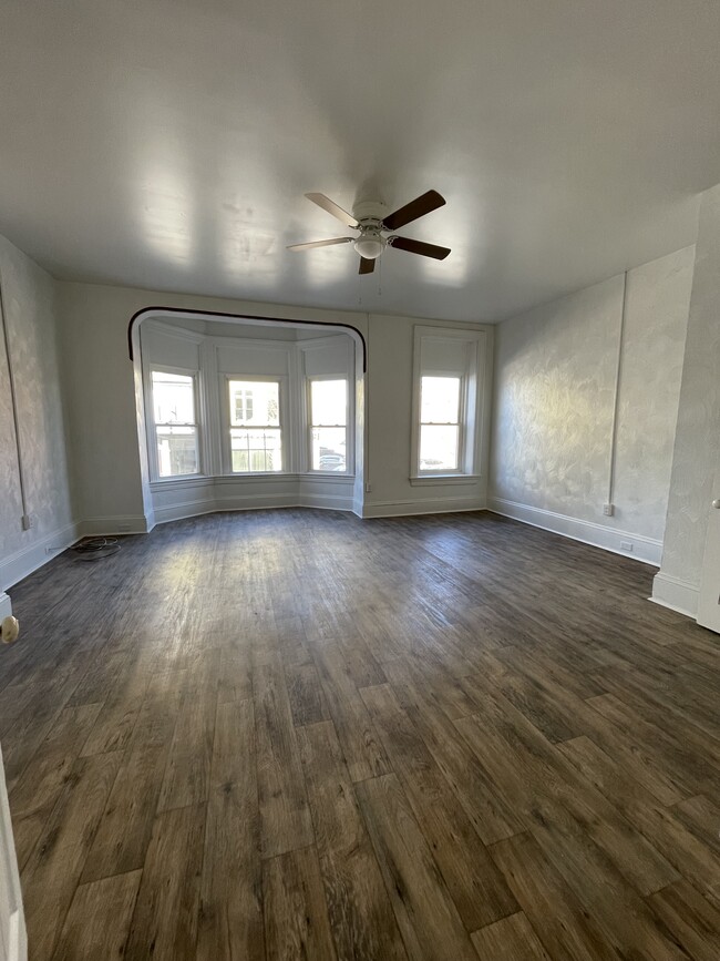 1st Large bedroom (or use as a large common room) - 334 W Market St Apartments