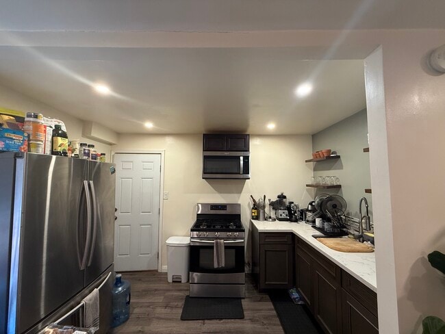 Kitchen includes stainless steel appliances w/ granite counter tops - 18173 Brightman Ave Unit B