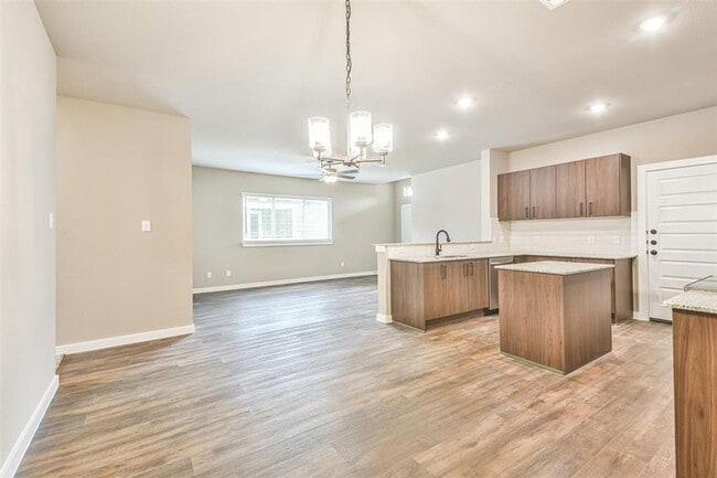 Photo - Modern 3-Bedroom Duplex with Granite Counters, Private Yard, and Prime Location