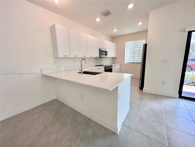 Photo - 8317 NW 45th St Townhome