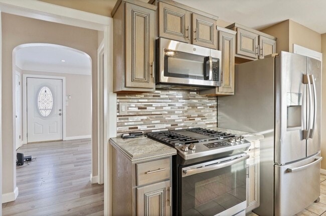 Photo - Designer-Inspired 3 Bedroom, 2 Bath Home With Finished Basement & In-Ground Pool