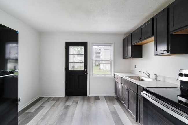 Photo - Coming Soon! 4-Bedroom Townhouse in Scenic...