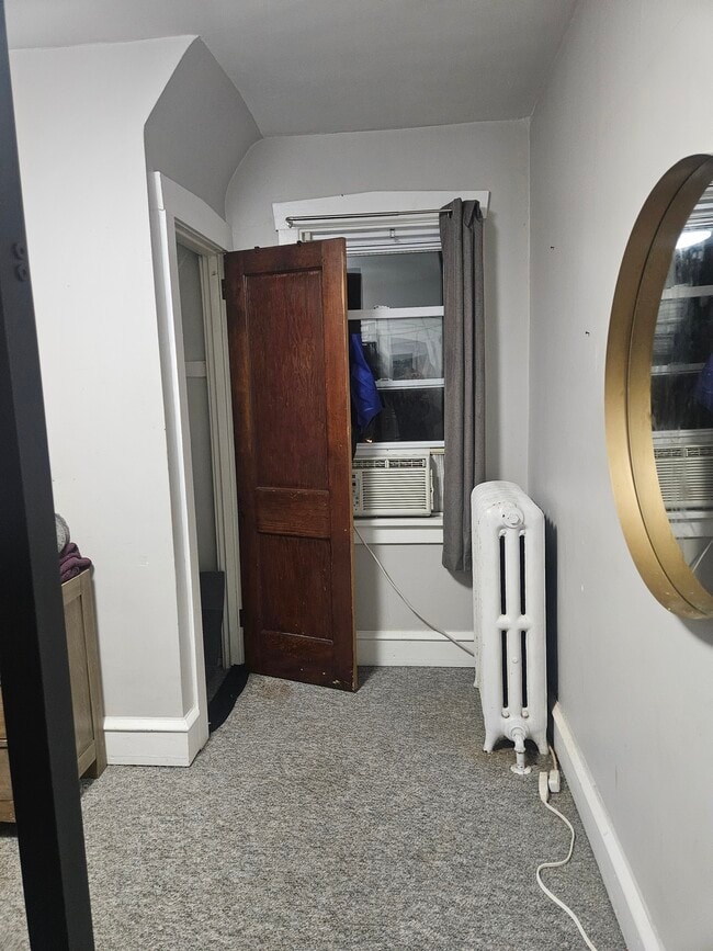 Radiator heat and window A/C unit. - 20 E Coulter Ave Unit Upstairs Bedroom