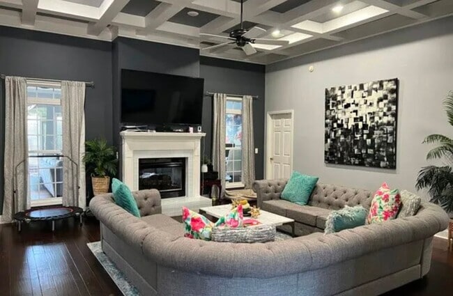 Photo - five bedrooms, five and a half bathrooms, a year-round heated swimming pool, and an ultimate back...