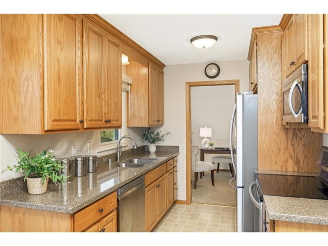 Photo - Spacious 4BR Home in Brooklyn Park – Huge Basement & New Appliances!