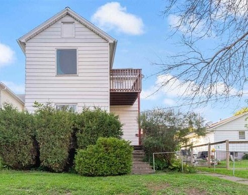 Building Photo - 325 E 8th St Unit 1