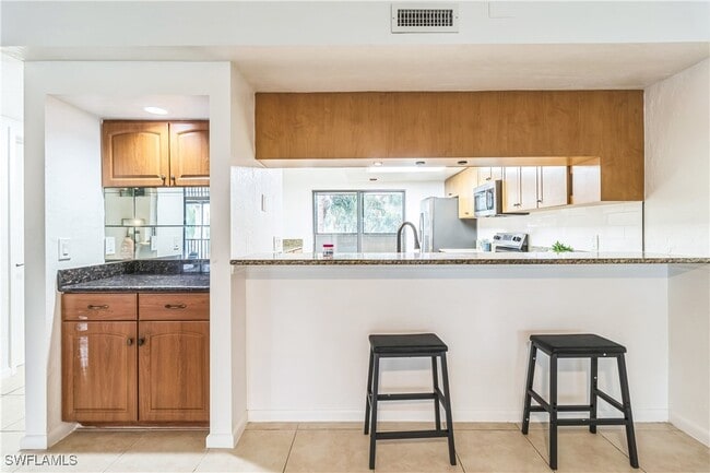 Building Photo - 16448 Timberlakes Dr Unit 202