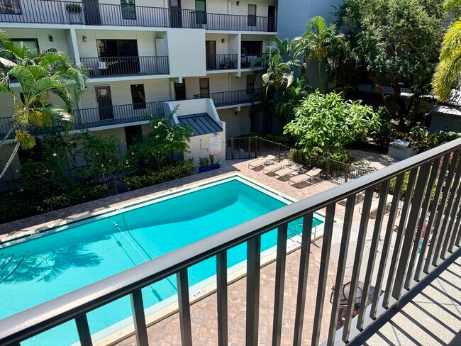 Pool view from private balcony - 105 4th Ave NE Unit 206