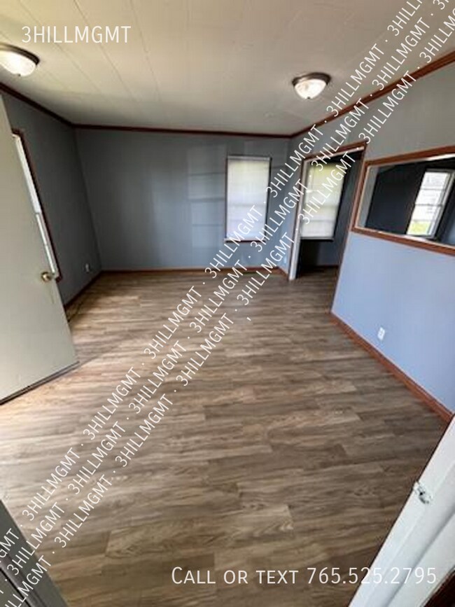 Building Photo - 5600 W Kilgore Ave Unit #102