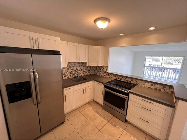 Building Photo - 15221 NE 6th Ave Unit A104