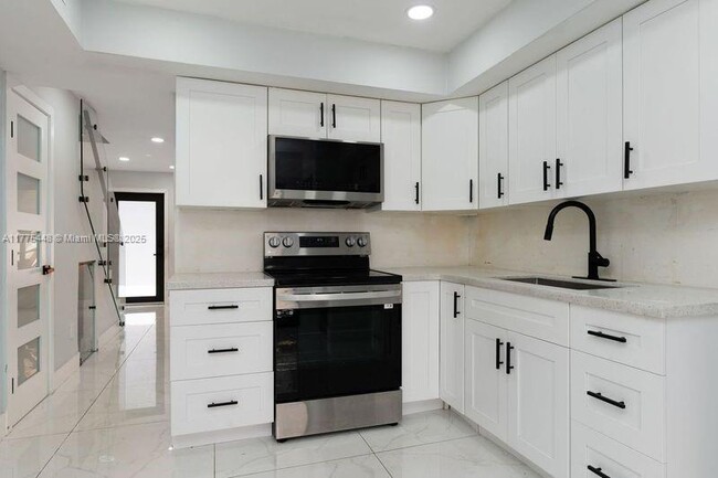 Building Photo - 5431 W 22nd Ct Unit 107 Rental