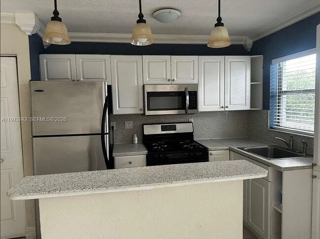 Building Photo - 7101 SW 89th Ct Unit 212