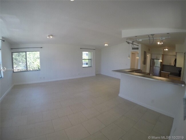 Building Photo - 6835 Rue Versailles Dr Unit 205 Rental