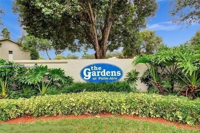 Building Photo - 715 Gardens Dr Unit 103
