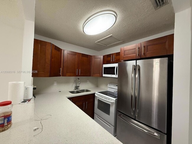 Building Photo - 6540 W 26th Dr Unit 2460
