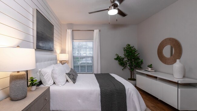 This thoughtfully crafted bedroom offers comfort and sophistication, perfect for unwinding after a long day.
