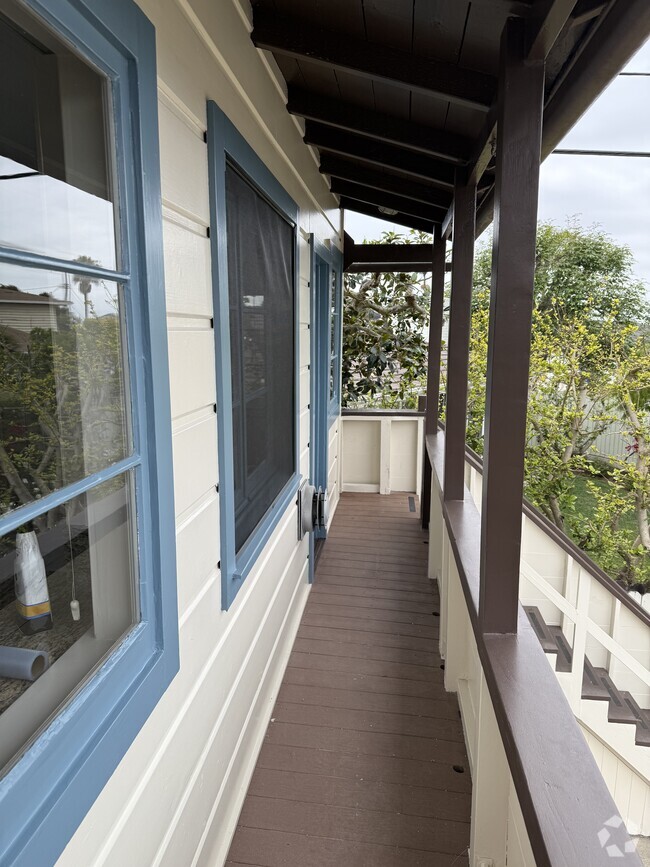 front balcony and stairs - 8252 Rees St Unit Spanish Cottage Rental