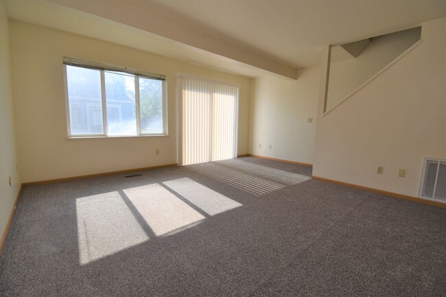 Photo - Townhouse-style End unit 3BD, 1.5 BA with attached garage Unit A