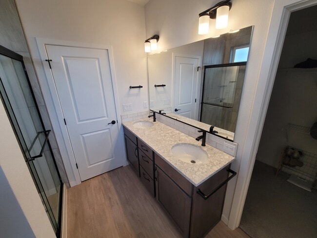 Master bath double vanity and shower with access to walking closet. - 1869 N Skagit Dr Unit 1869Skagit