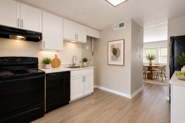 Elevate your lifestyle at The Preserve On Conley Apartments with a sleek, modern kitchen featuring stylish finishes and ample light. Enjoy inviting spaces designed for comfort and convenience. Schedule a tour today to see your future home!